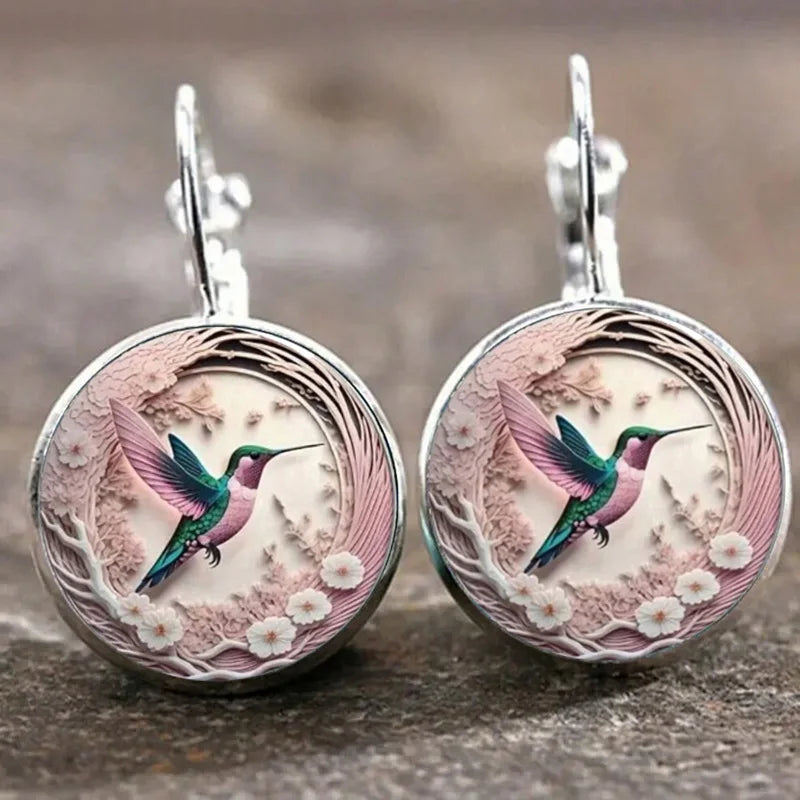Collana con pendente a cupola in vetro con colibrì
