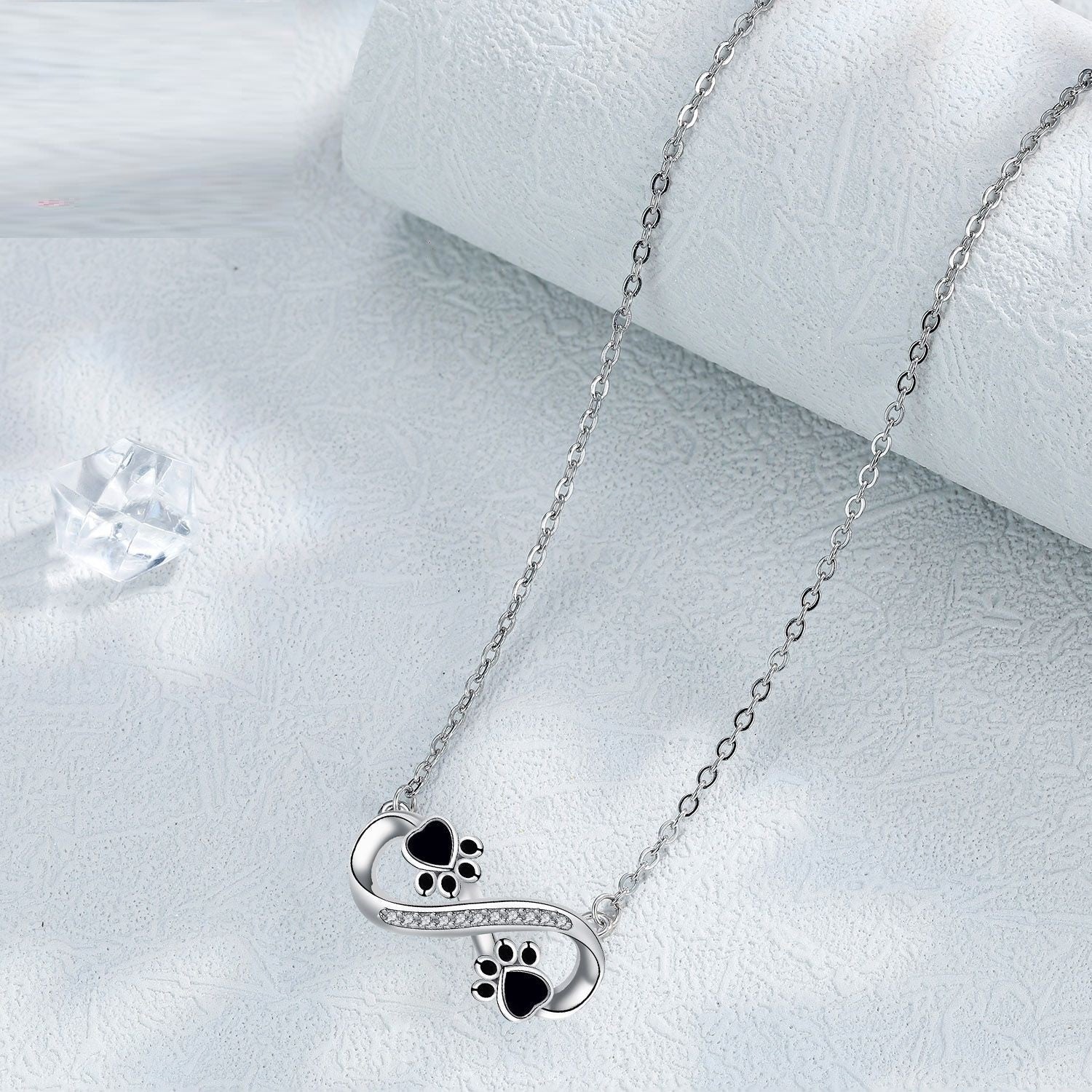 Collana Infinity con impronta di zampa e zirconi