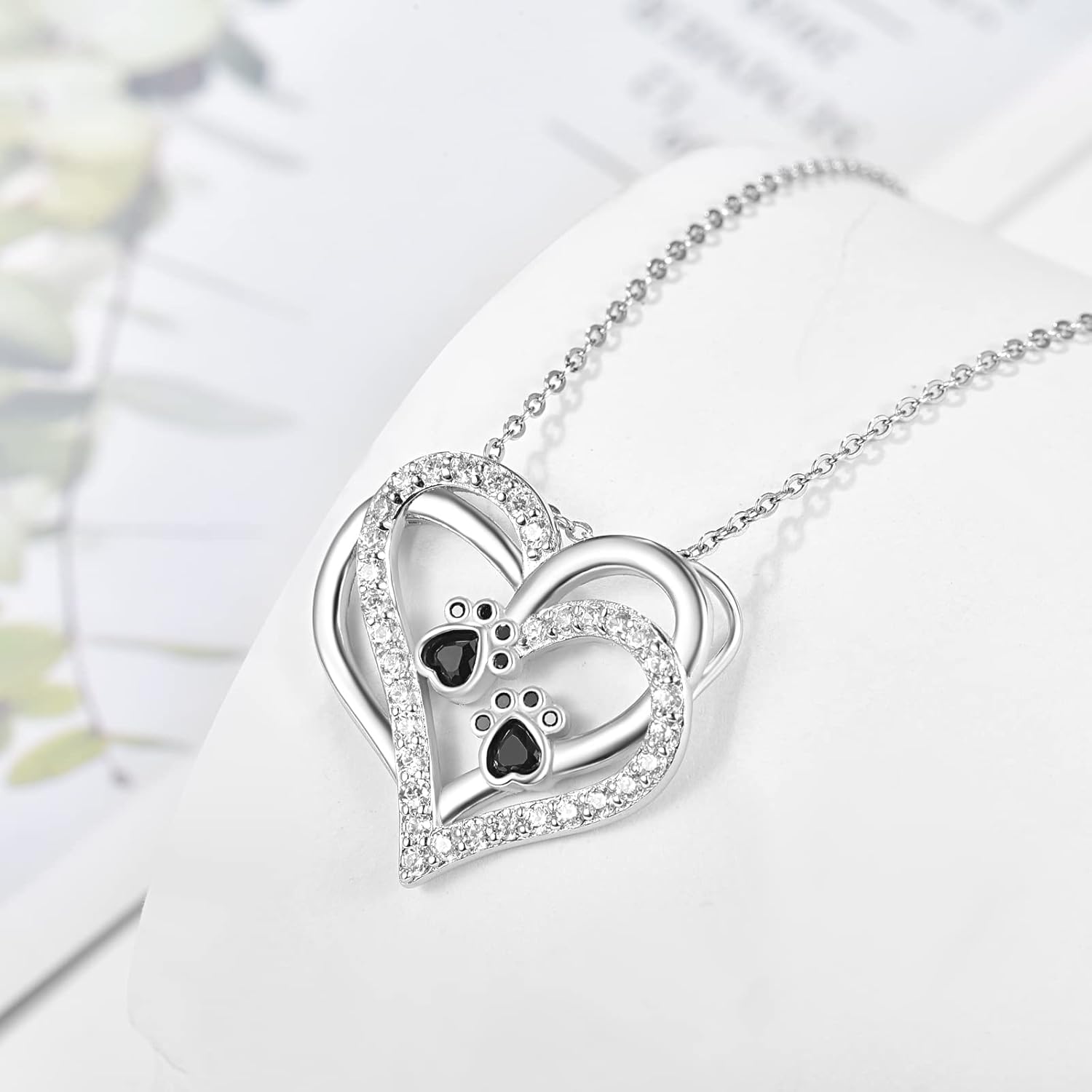 Collana con cuore e zampa di cane con zirconi